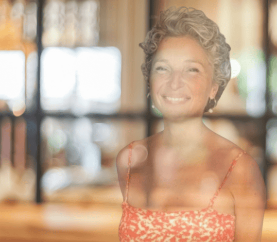A photo of faded image of Jenny with blur background